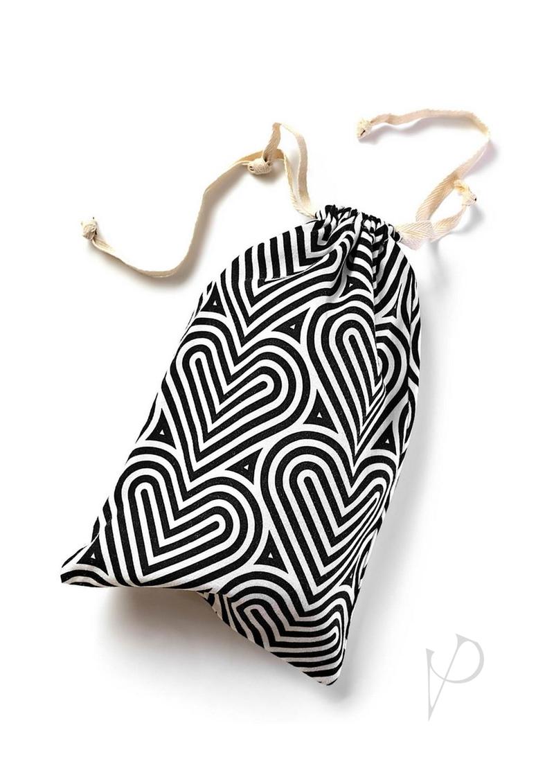 Blush The Collection Bomba cotton toy storage bag in a black and white heart print, lying flat with its drawstring ties