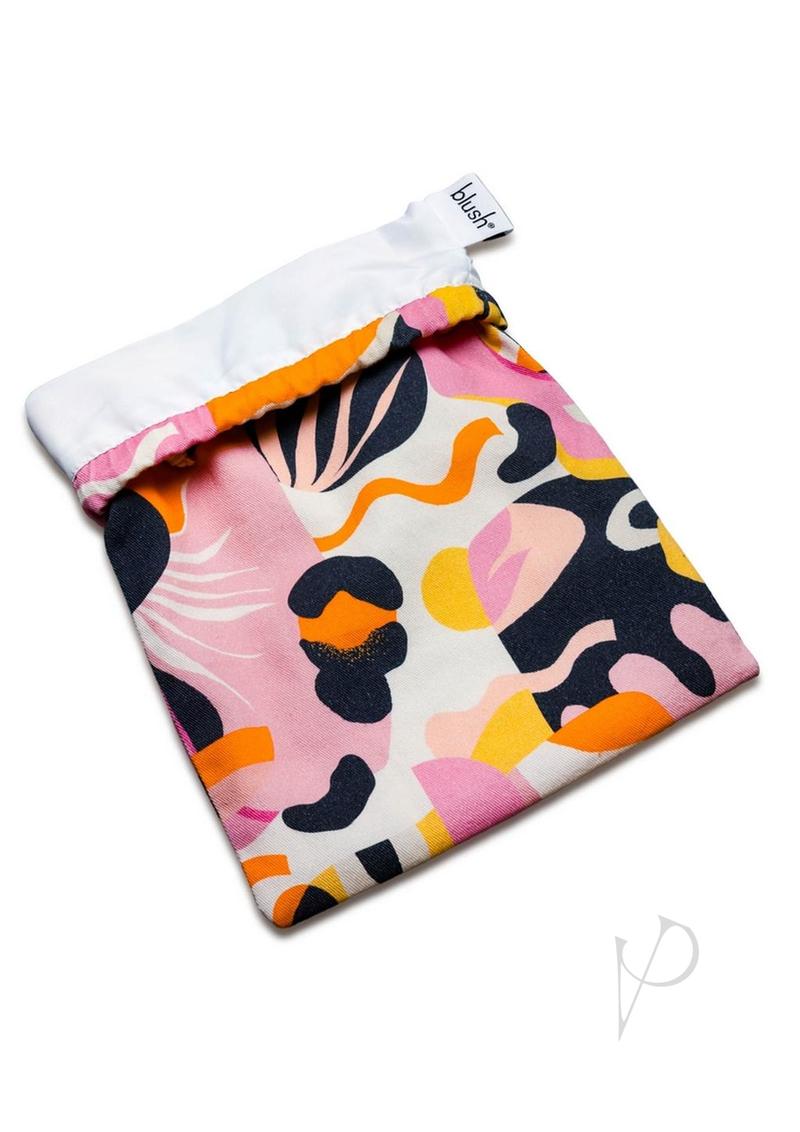 Blush The Collection Burst cotton toy storage bag in a pink, orange and navy abstract print, top folded back to show the lining