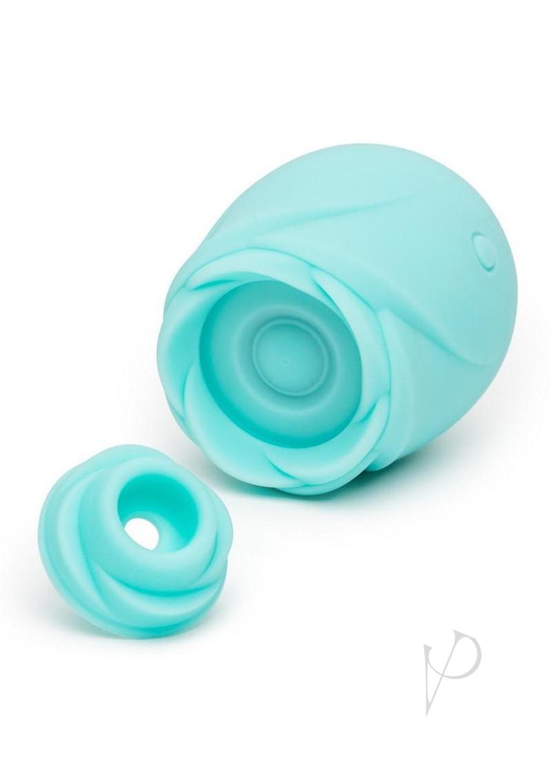 ROMP Rose Glow air pulse stimulator in blue, with the stimulating head removed